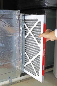 Changing air filter clearance in ac unit