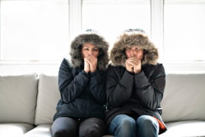 cold-man-and-woman-in-parkas